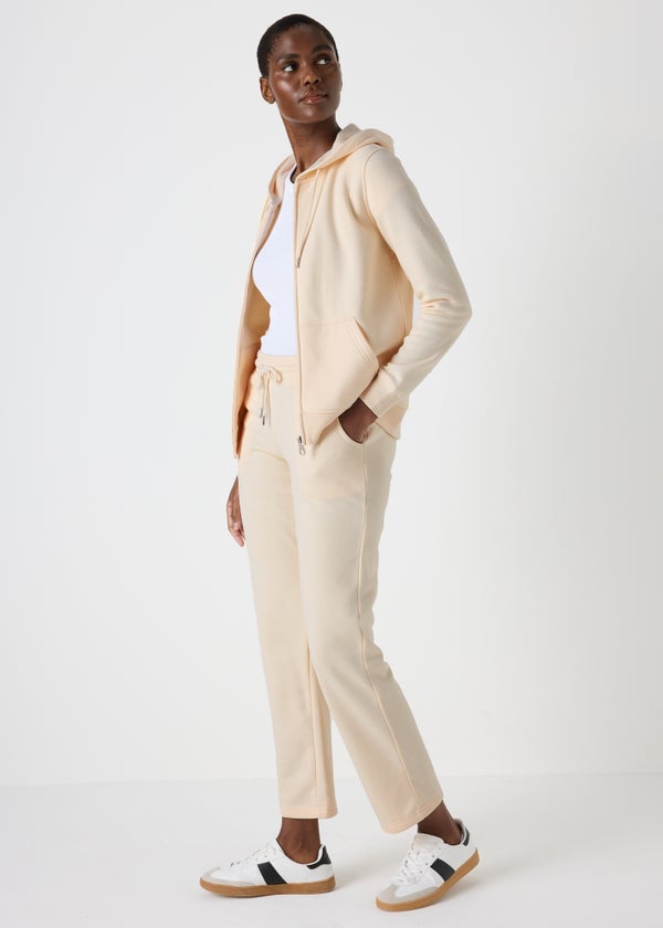 Cream jogging bottoms store