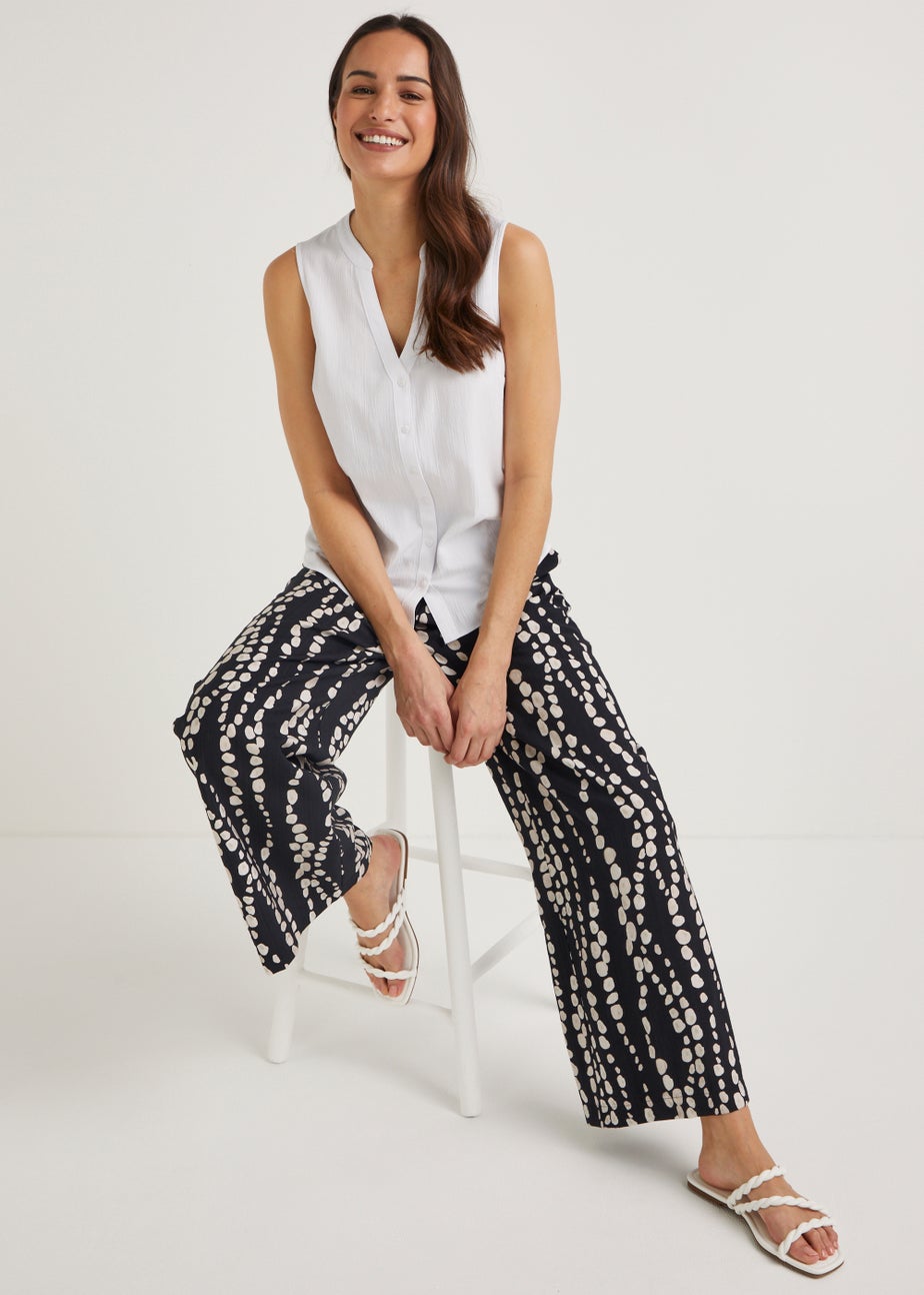 White Sleeveless Blouse