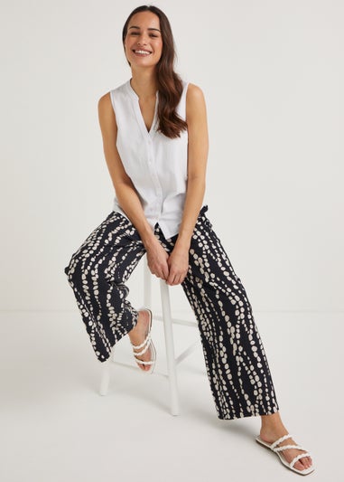 White Sleeveless Blouse