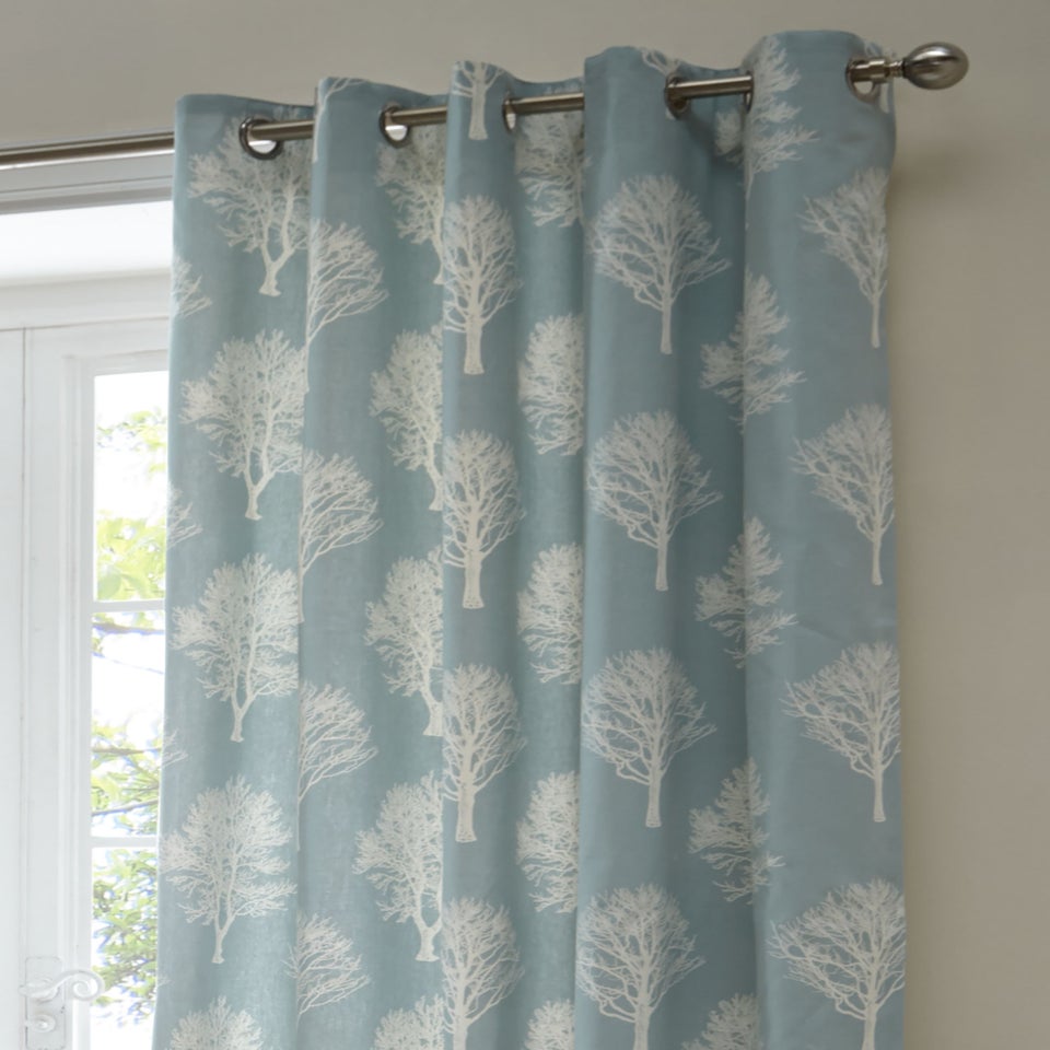 Fusion Woodland Trees Blue Eyelet Curtains