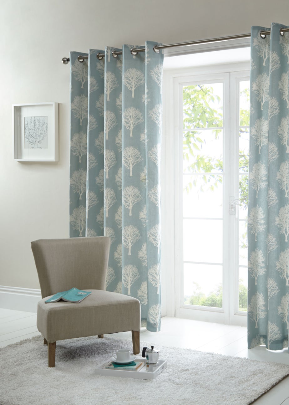 Fusion Woodland Trees Blue Eyelet Curtains
