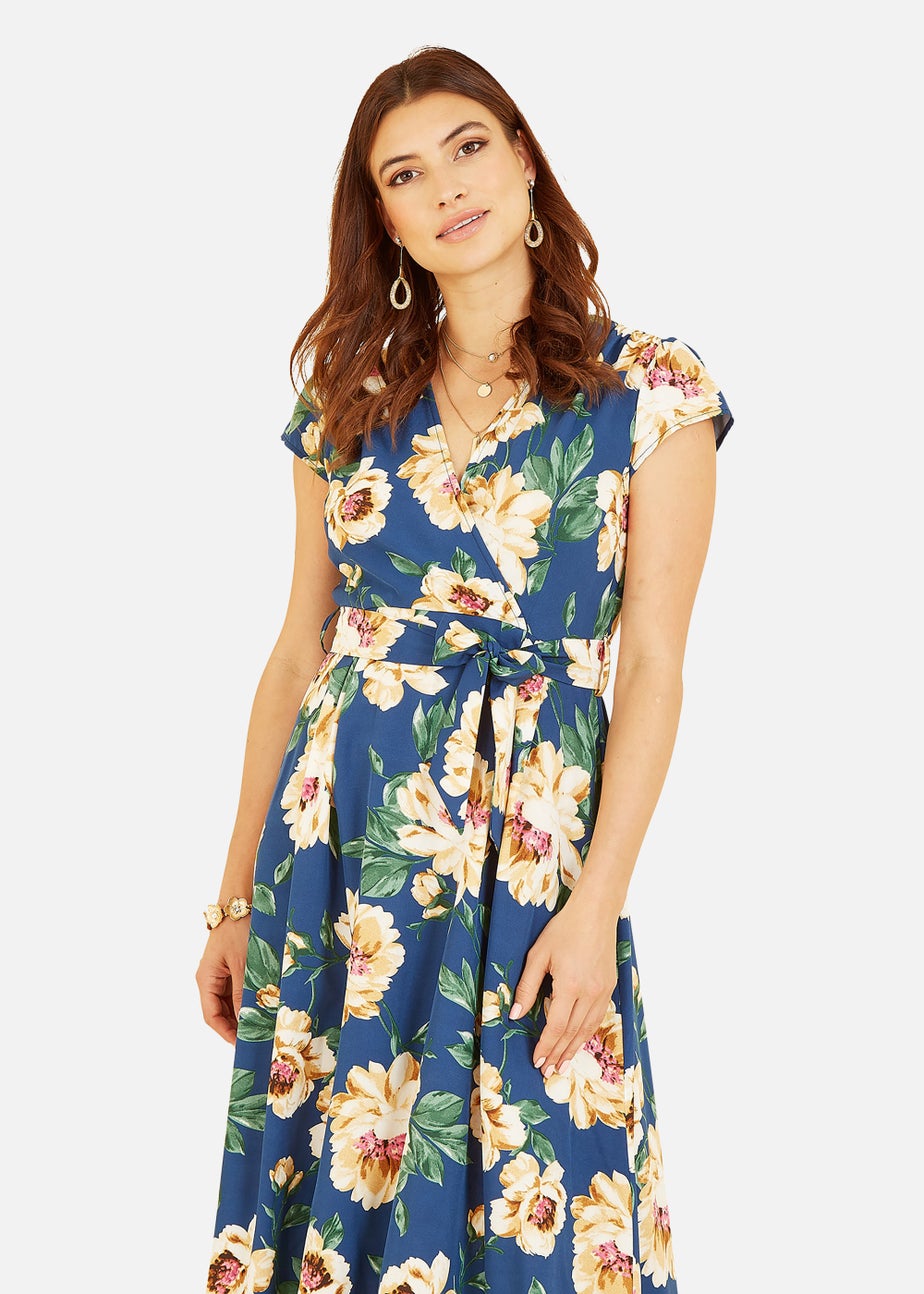 Mela Painted Floral Print Dipped Hem Wrap Dress In Blue