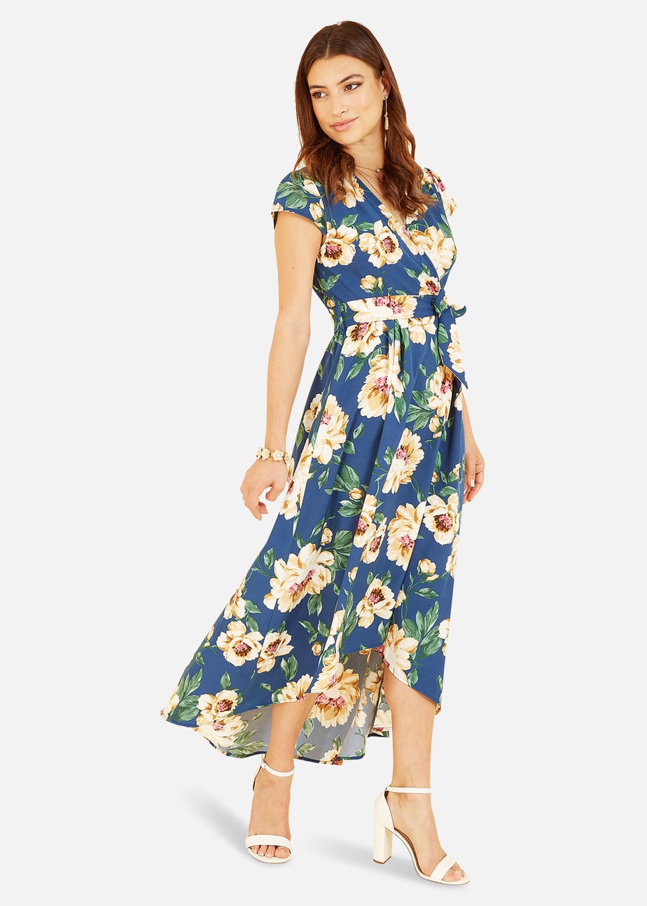 Mela Painted Floral Print Dipped Hem Wrap Dress In Blue