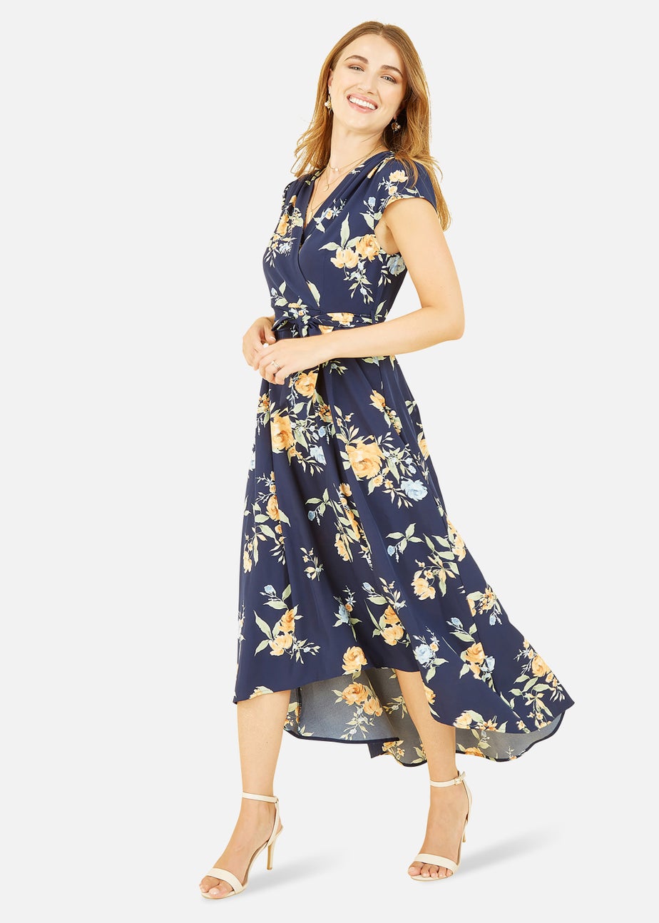 Mela Floral Print Dipped Hem Wrap Dress In Navy