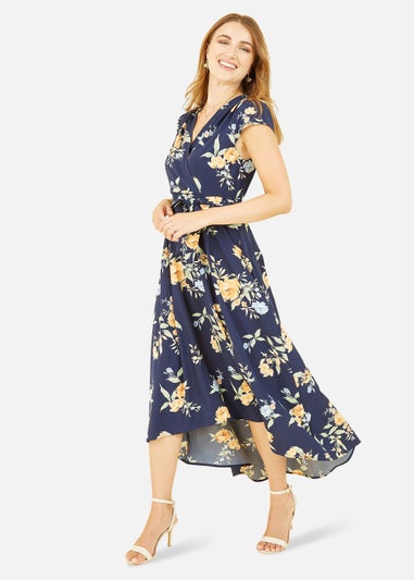 Mela Floral Print Dipped Hem Wrap Dress In Navy