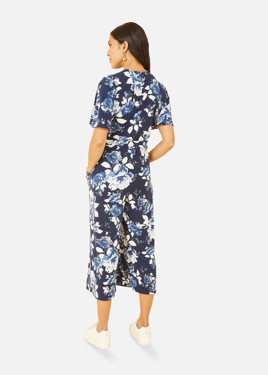 Mela Rose Print Jumpsuit With Angel Sleeves In Navy