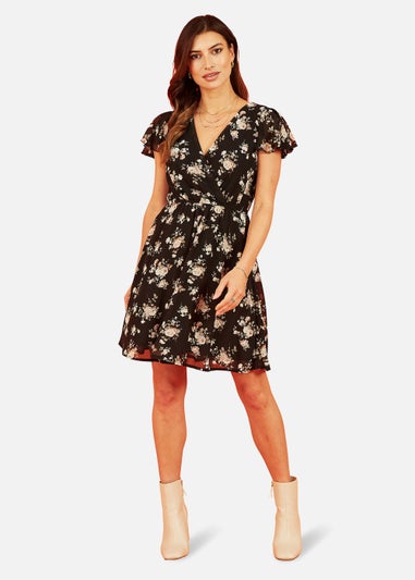 Mela Floral Print Wrap Over Skater Dress In Black