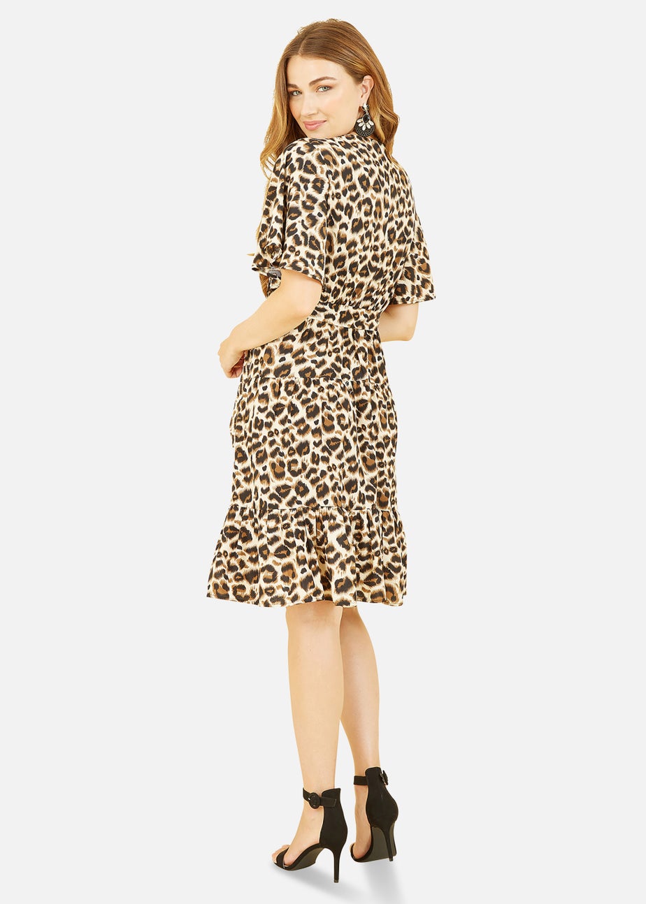 Mela Animal Print Wrap Over Skater Dress In Brown