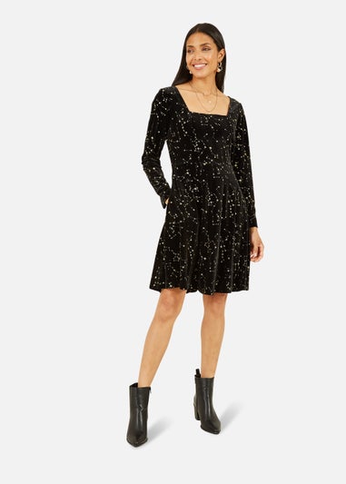 Mela Star Foil Print Long Sleeve Skater Dress In Black