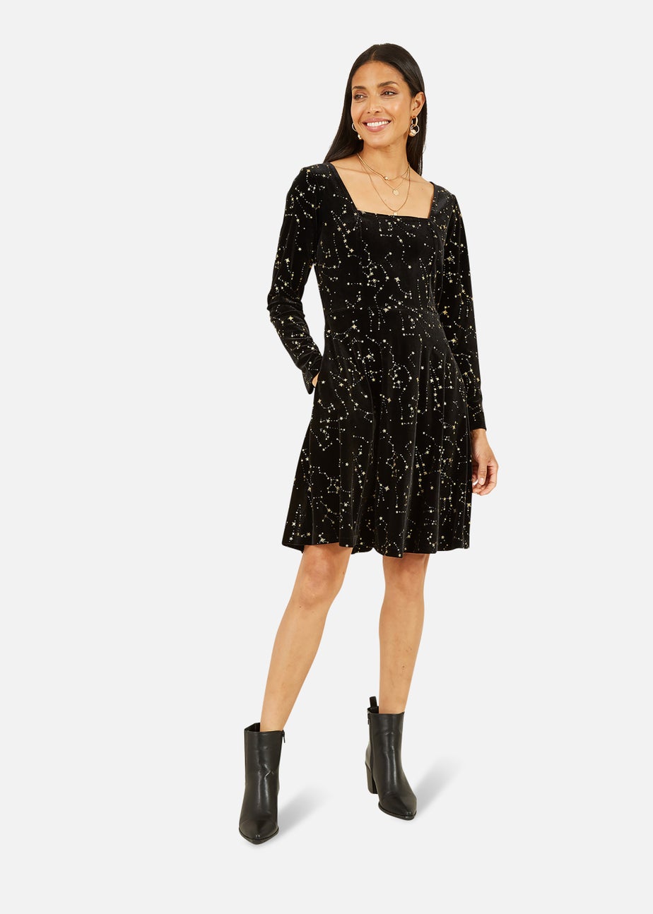 Mela Star Foil Print Long Sleeve Skater Dress In Black
