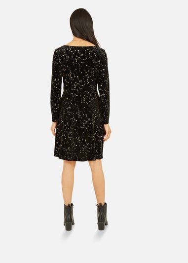 Mela Star Foil Print Long Sleeve Skater Dress In Black