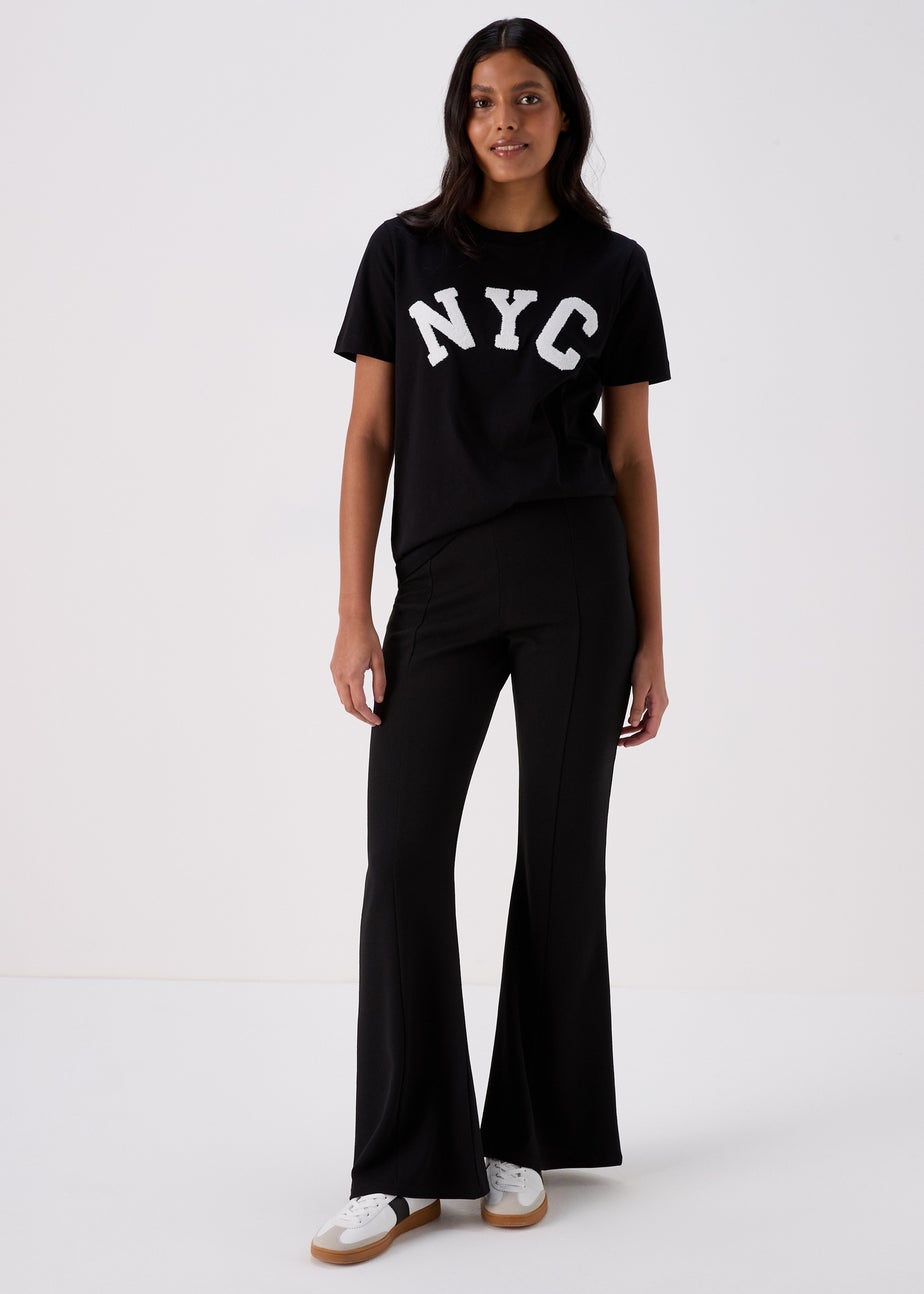 Black Kick Flared Trousers