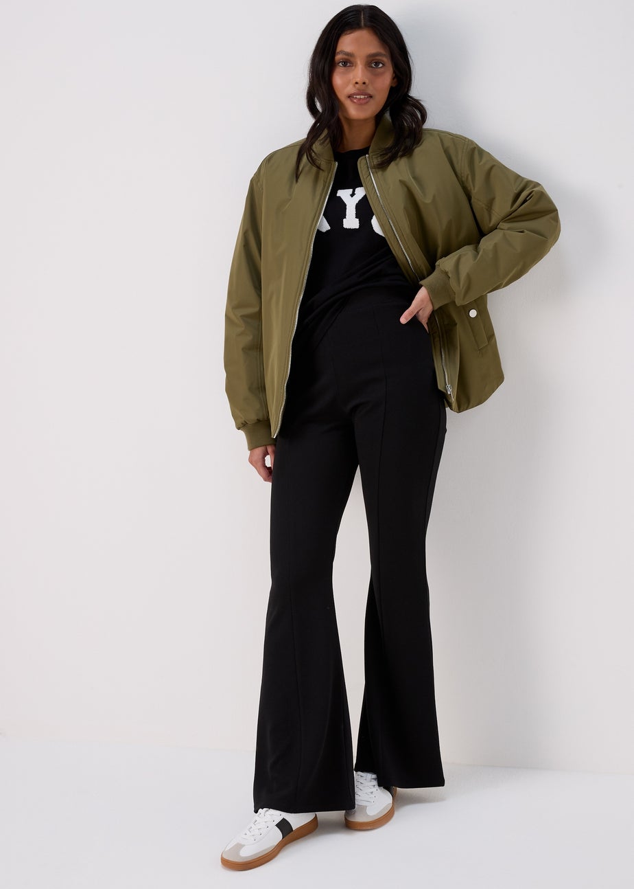 Black Kick Flared Trousers