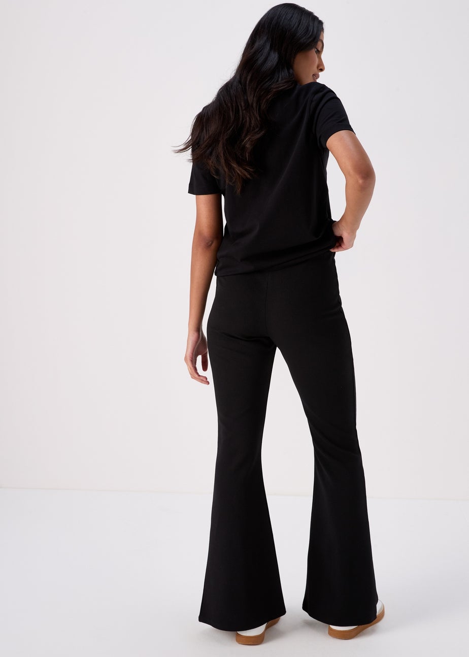 Black Kick Flared Trousers