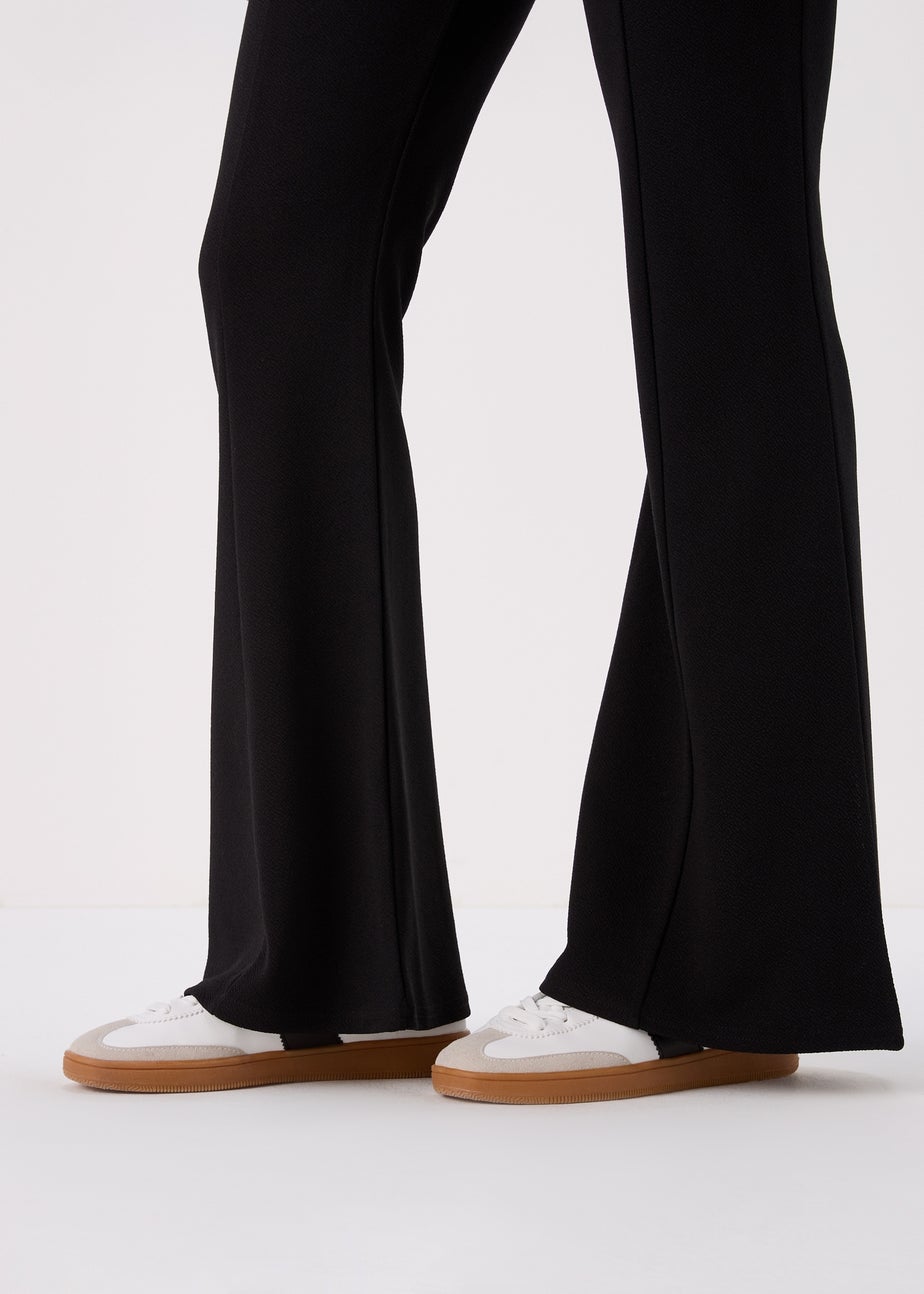 Black Kick Flared Trousers