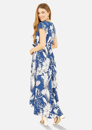 Mela Navy Leaf Print Dipped Hem Wrap Dress