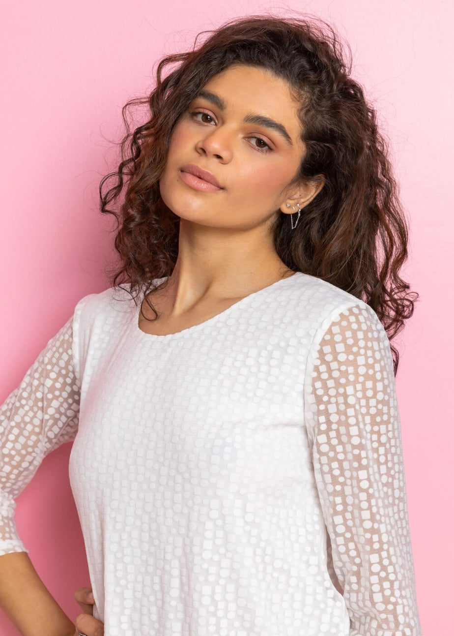 Roman Ivory Burnout Print Asymmetric Hem Top