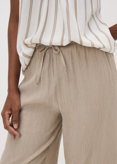 Beige Textured Wide Leg Trousers