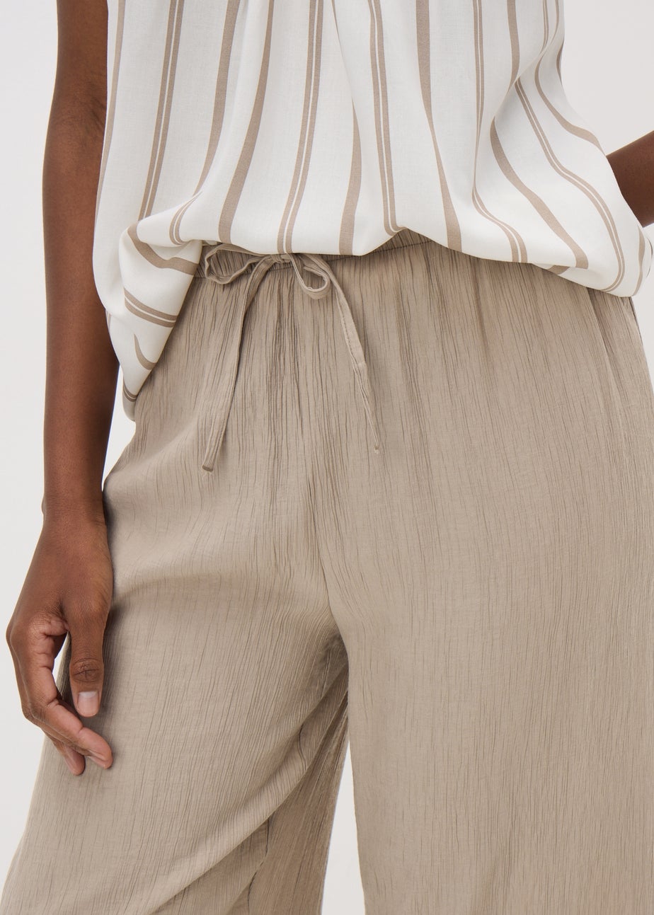 Beige Textured Wide Leg Trousers