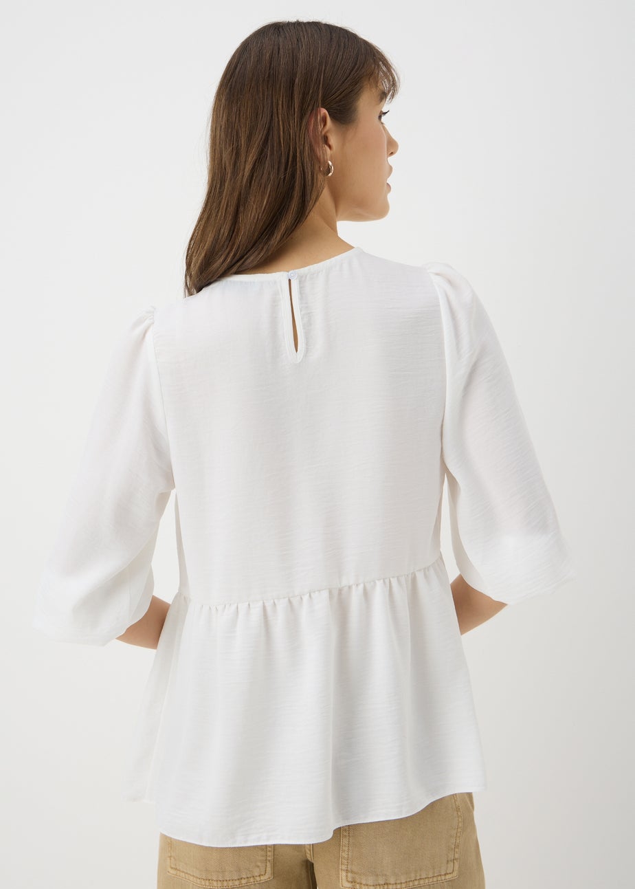 Ivory Tie Neck Peplum Blouse