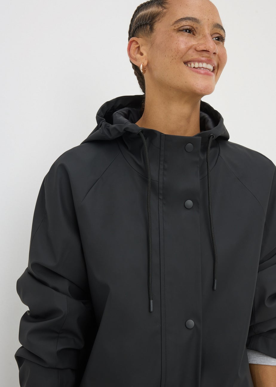 Black Rubberised Showerproof Parka Coat