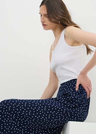 Navy Polka Dot Flared Hem Skirt