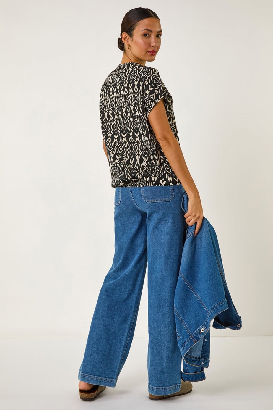 Roman Black Geometric Ikat Print Bubble Hem Top