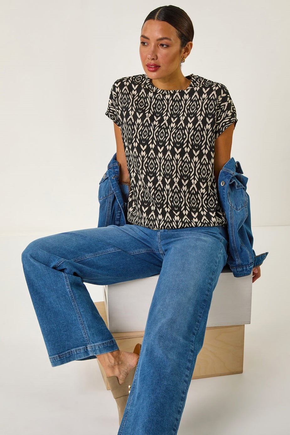 Roman Black Geometric Ikat Print Bubble Hem Top