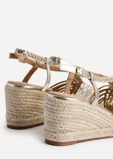 Linzi Evolve Gold Faux Leather Woven Espadrille Wedge