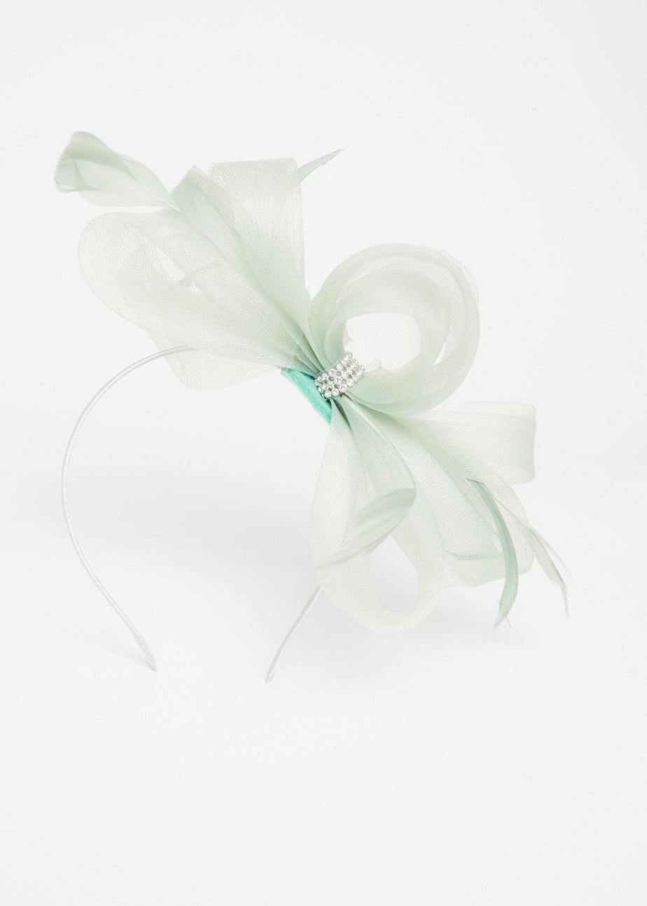 Quiz Green Diamante Bow Headband Fascinator