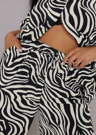 Yours Curve Black & White Zebra Wide Leg Trousers
