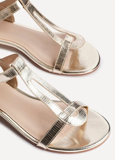 Linzi Deluxe Wide Fit Gold Faux Leather T Bar Looped Low Heeled Sandal