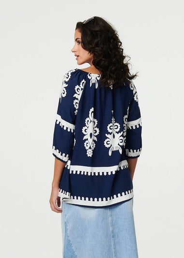 Izabel London Navy Ikat Print Tassel Tie Neck Blouse