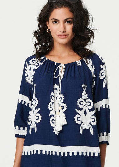 Izabel London Navy Ikat Print Tassel Tie Neck Blouse