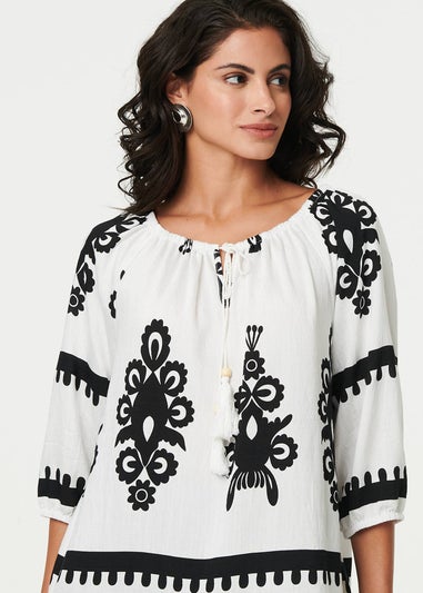 Izabel London White Ikat Print Tassel Tie Neck Blouse