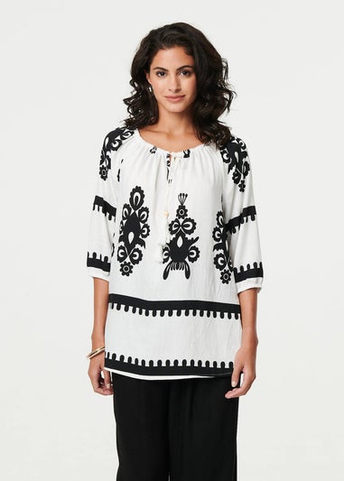 Izabel London White Ikat Print Tassel Tie Neck Blouse
