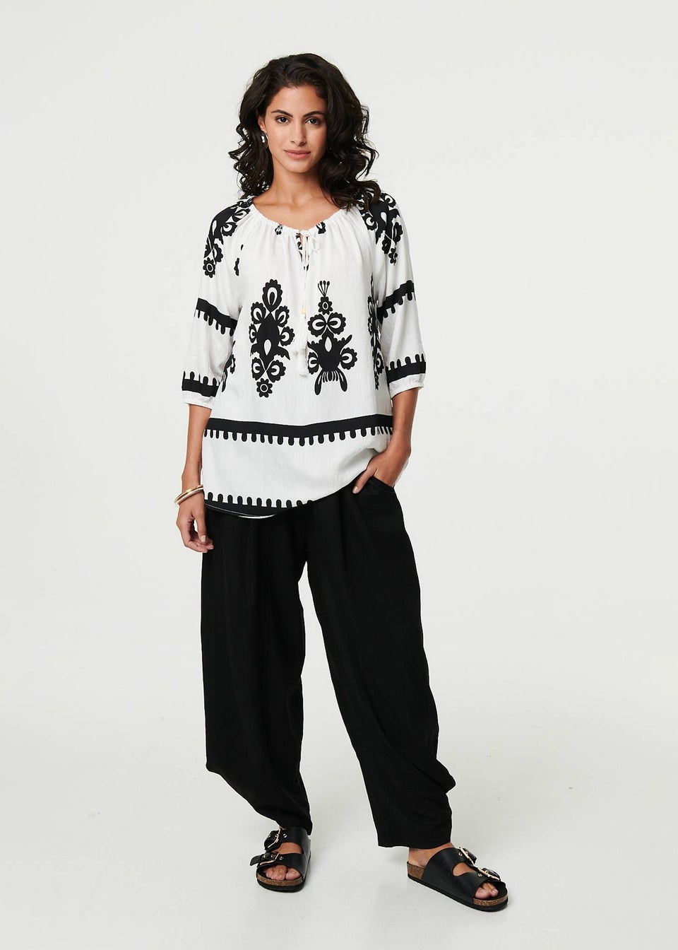 Izabel London White Ikat Print Tassel Tie Neck Blouse