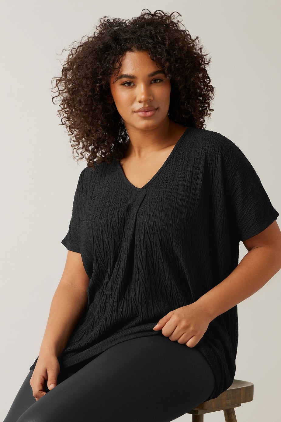 Evans Curve Black Plisse Pleat Front Top