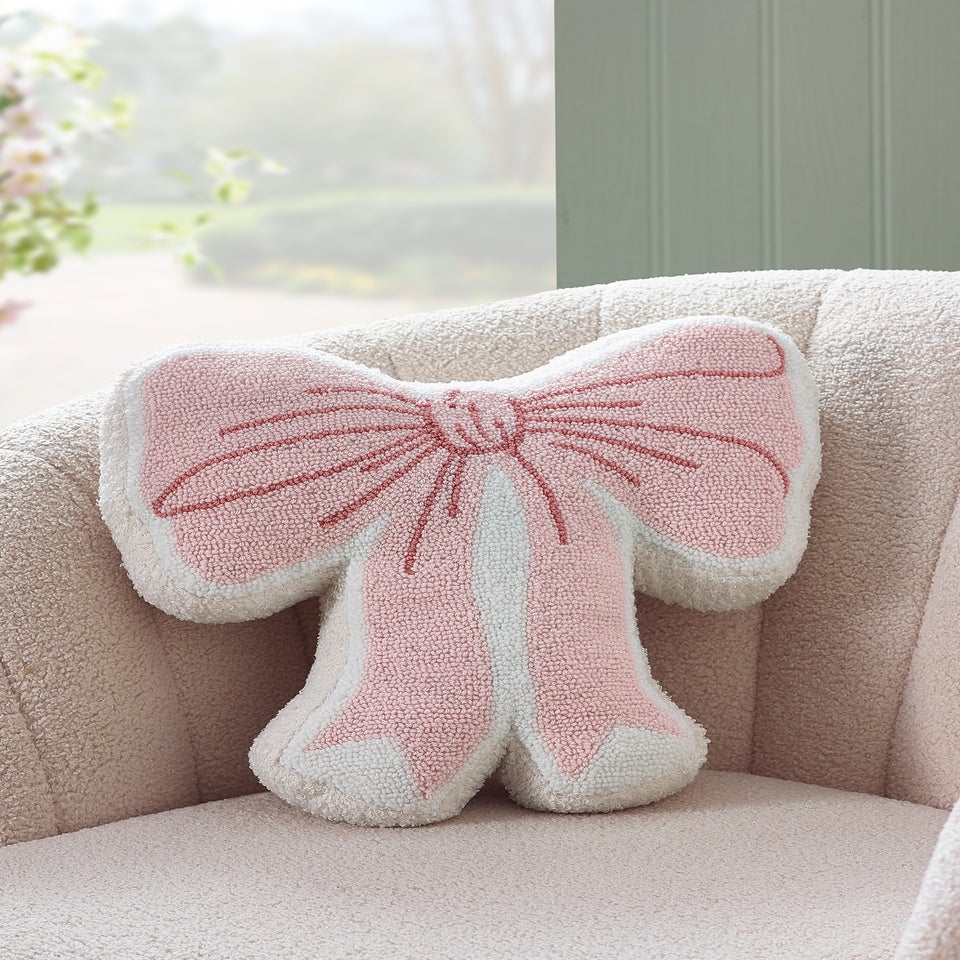 Catherine Lansfield Bow Boucle 3D Shaped Cushion Pink