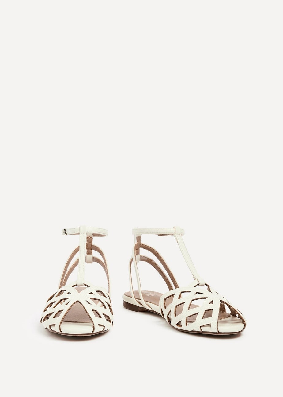 Linzi Santi Ivory Faux Leather Caged Flat Sandal