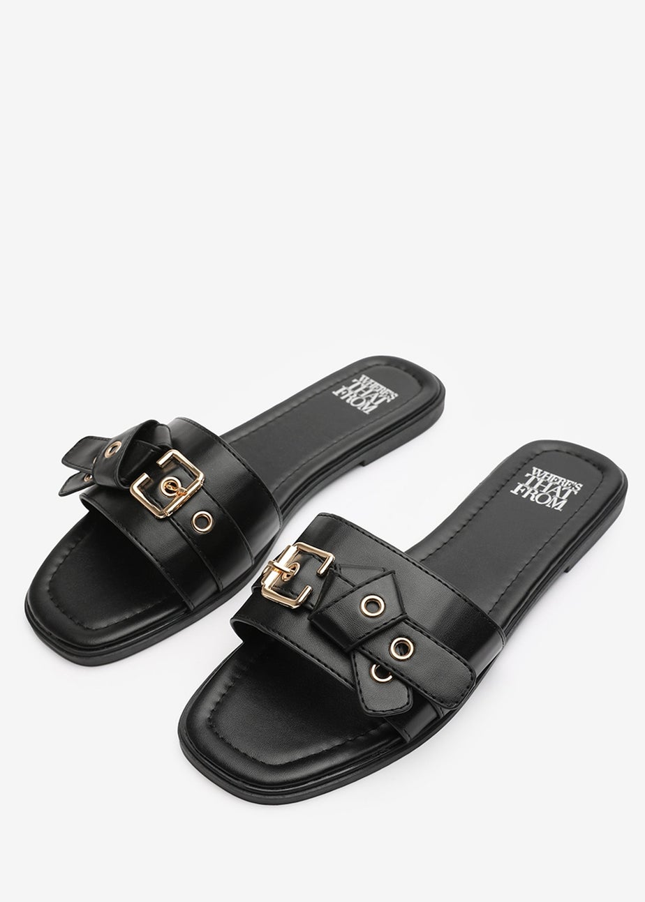 Where's That From Lucy Black Slip-On Sandals with Buckle Accent
