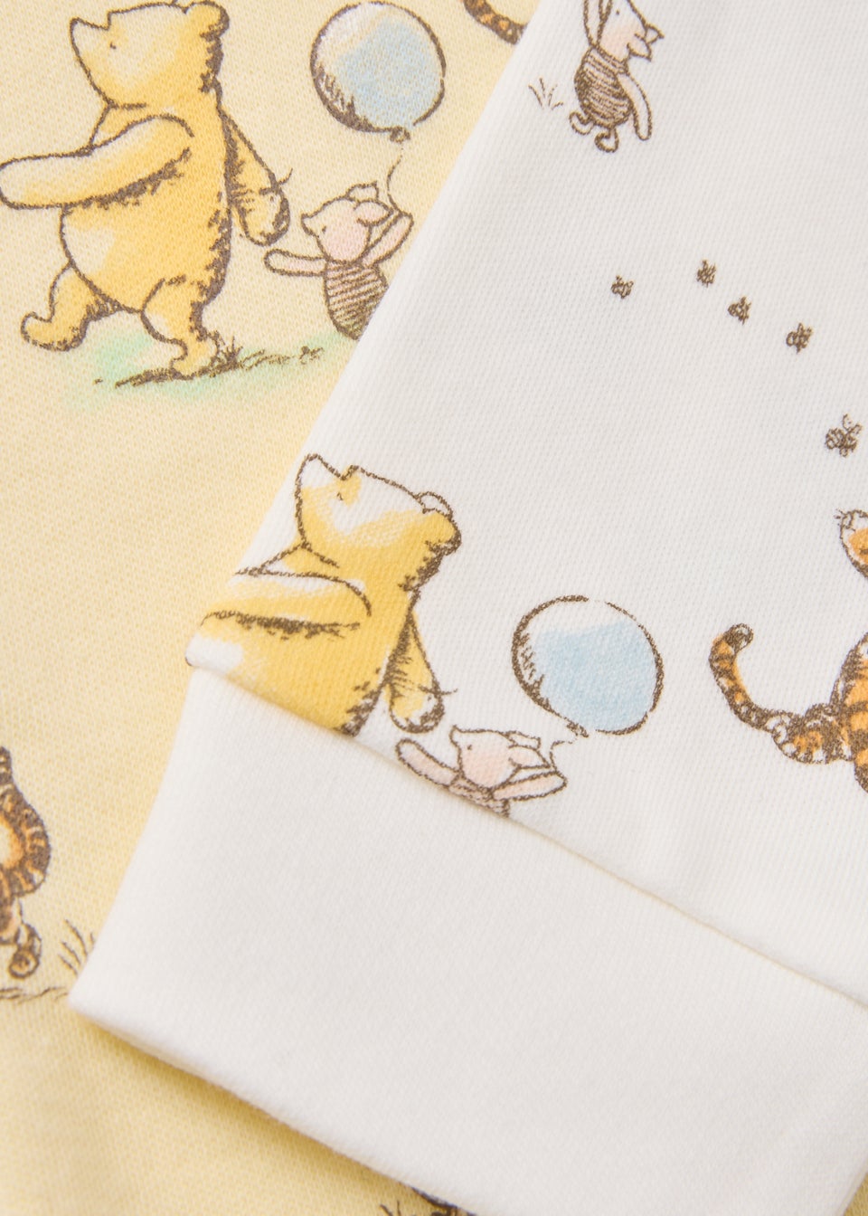 2 Pack Cream Winnie The Pooh Sleepsuits