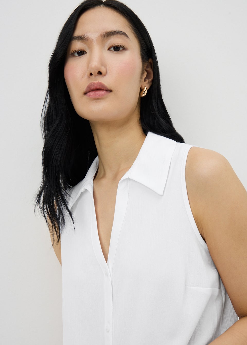 White Sleeveless Clipper Shirt