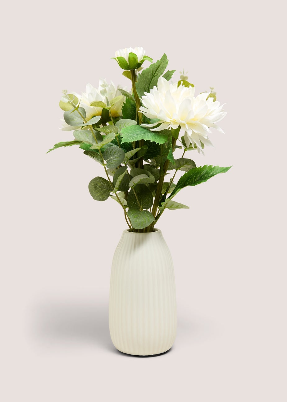 White Flowers In Ribbed Pot