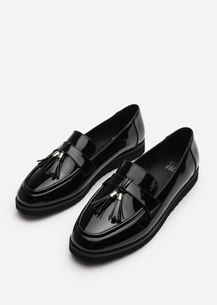 Where's That From Kennedy Tasseled Loafers in Black Patent Finish