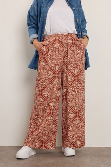 Yours Curve Rust Brown Paisley Crinkle Wide Leg Trousers