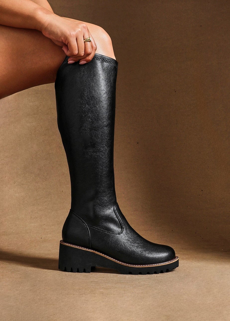 Linzi Maintain Wide Fit Black Faux Leather Stretch High Leg Wedge Boot