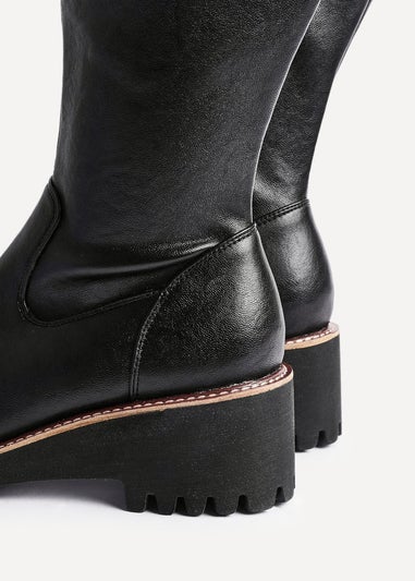 Linzi Maintain Wide Fit Black Faux Leather Stretch High Leg Wedge Boot