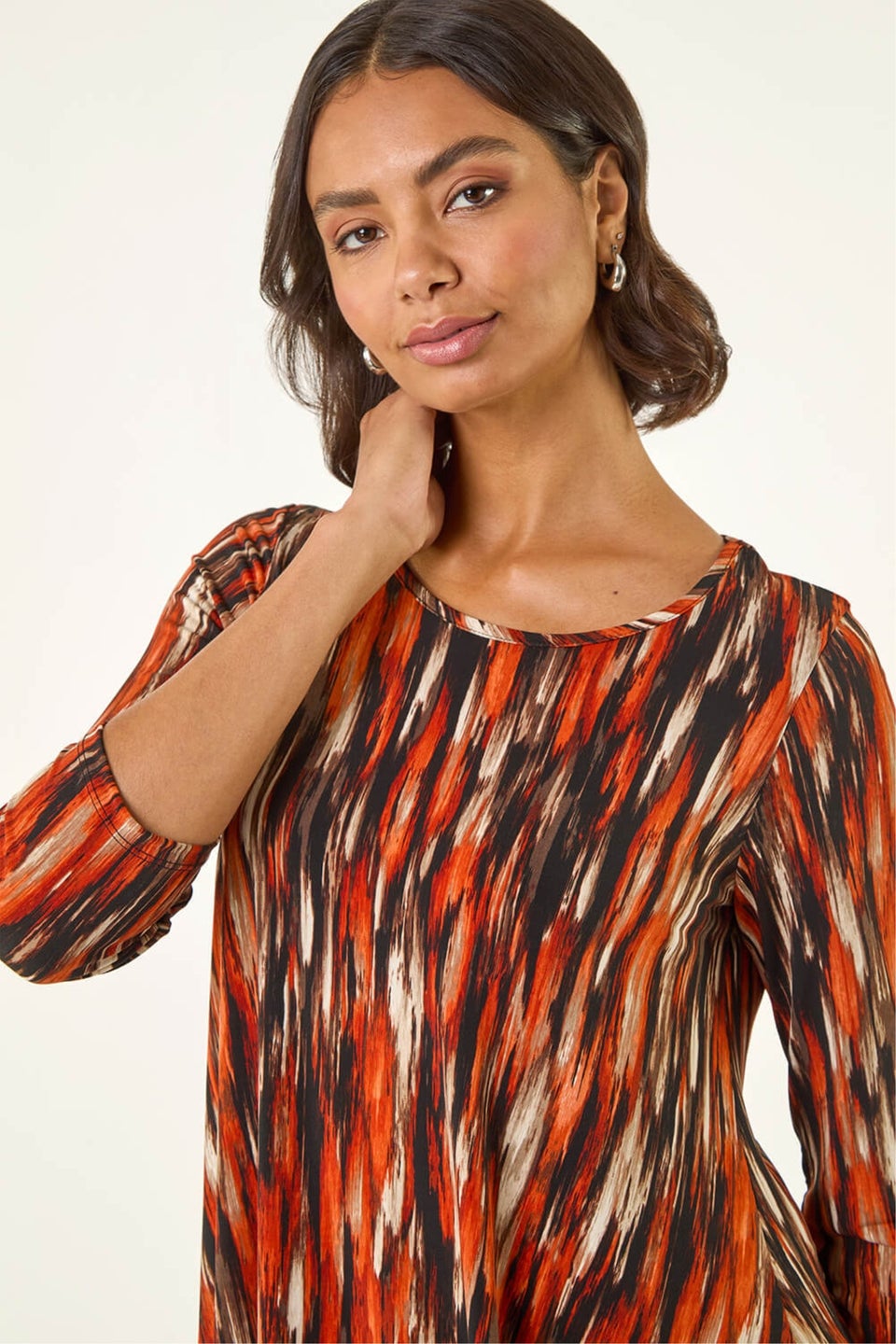 Roman Orange Abstract Print Hanky Hem Stretch Top