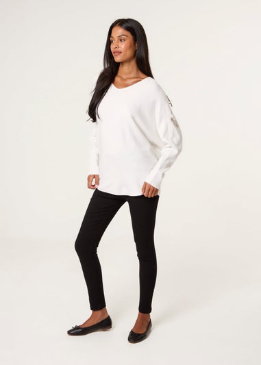 Blue Vanilla Ivory Diamante Bow Cut Out Sleeve Jumper